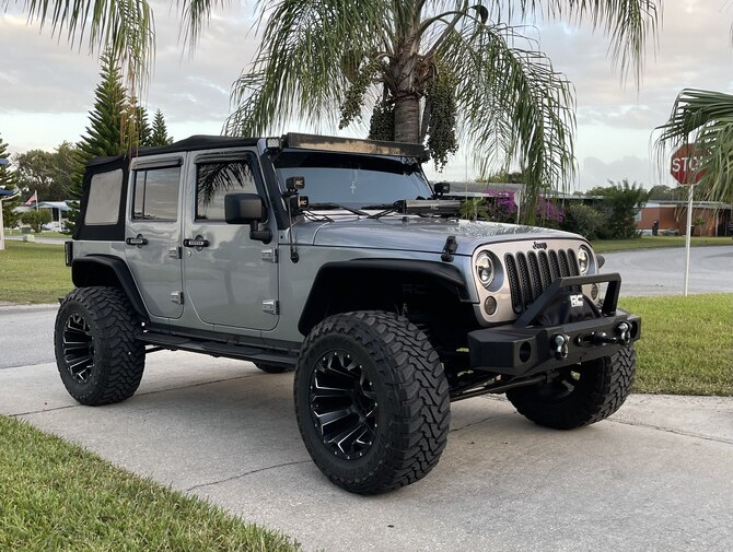 2014 Jeep Wrangler Sport Toyo Open Country M/T 37/13.50R20 (7126)